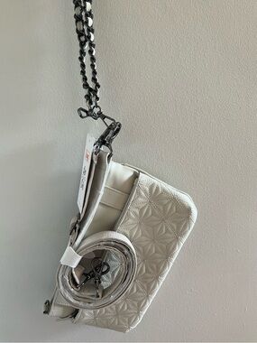 lug Flyer pebble coloured and Silver crossbody bag that converts to waist bag.